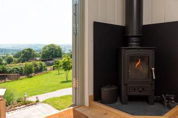The warming wood-burner ensures cosiness whatever the time of year.