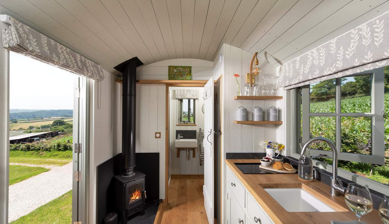 The cosy wood burner will keep you toasty on cooler days. 