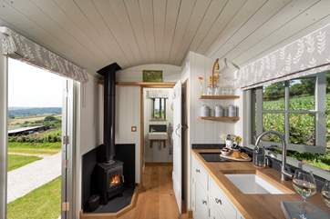 The cosy wood burner will keep you toasty on cooler days.