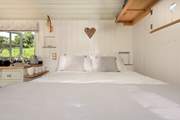 Rest your heads in the comfy double bed after a day out and about.