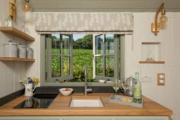 The kitchen is well-equipped with everything you'll need for your glamping getaway.