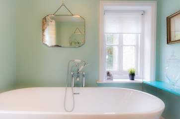 ...with bath and wash-basin. There is a separate WC next door.