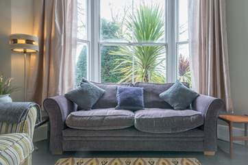 Plenty of space for two families as each sitting-room has a television.