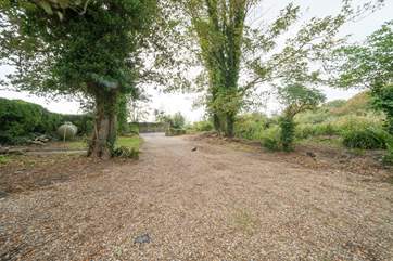 Plenty of parking space for up to four cars. Please note the garden is open to the driveway and therefore not secure.