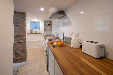 The kitchen is compact but equipped with everything you will need to create some of your favourite dishes.