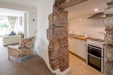 Step down into the kitchen from the sitting/dining-room.