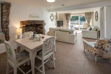 The lovely open plan arrangement of the sitting and dining areas.