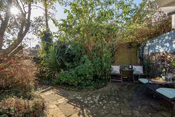 Even on a crisp November morning, the garden area still looks like a great spot to hide away from the world and seek a spot of peace and quiet.