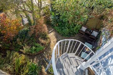 Wind your way down into this pretty garden area. Please take with the little ones when descending.