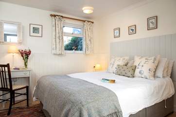 The main bedroom has a king-size bed (Bedroom 3).