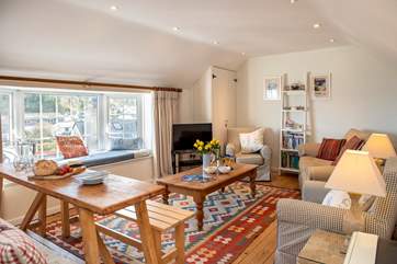 The open plan living space is full of colour.