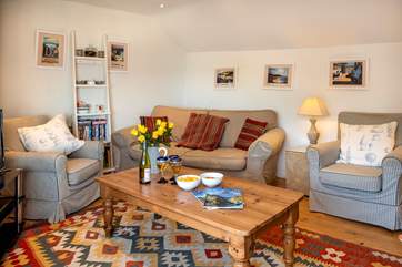Snuggle up together on a stormy winter's day (the sofa is now cream)/