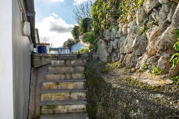 The steps leading up from the back door to the terrace.
