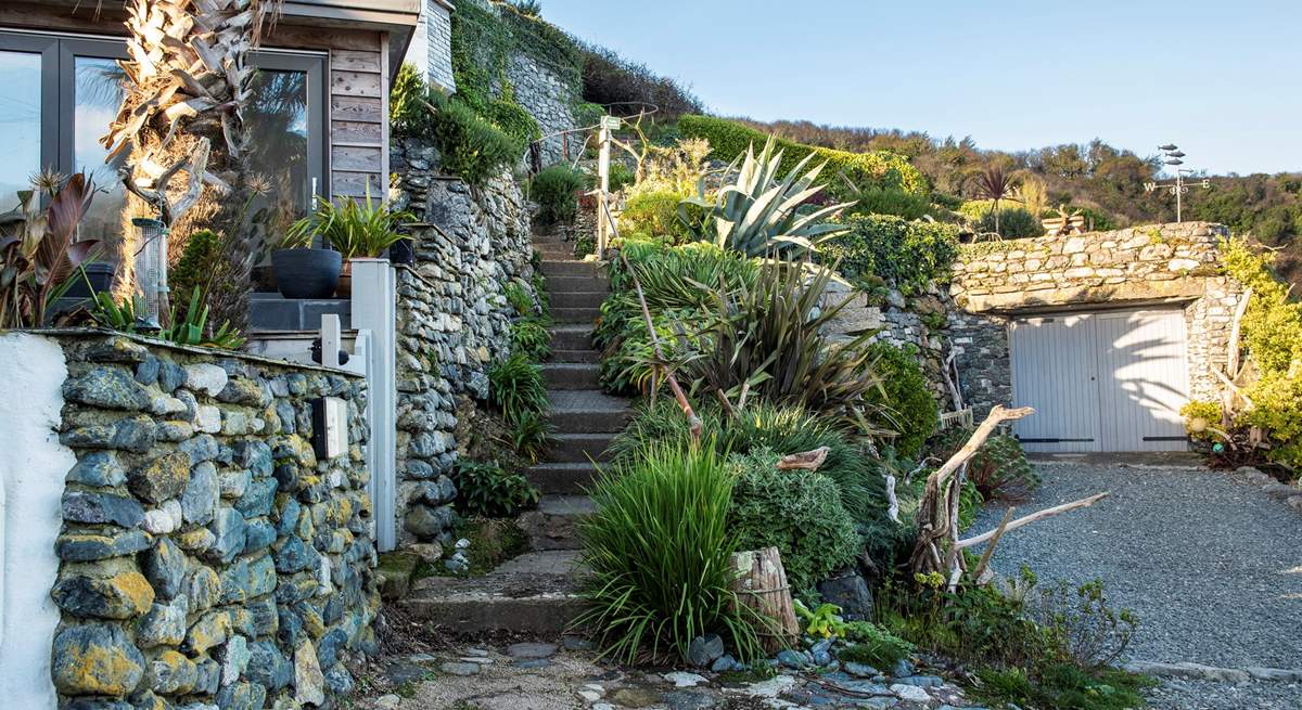 The steps from the beach leading up the coast path to Bank Cottage on the left. 