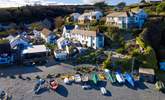 Bank Cottage is the middle cottage in the row of white traditional cottages and you can park on the beach car park below.  - Thumbnail Image