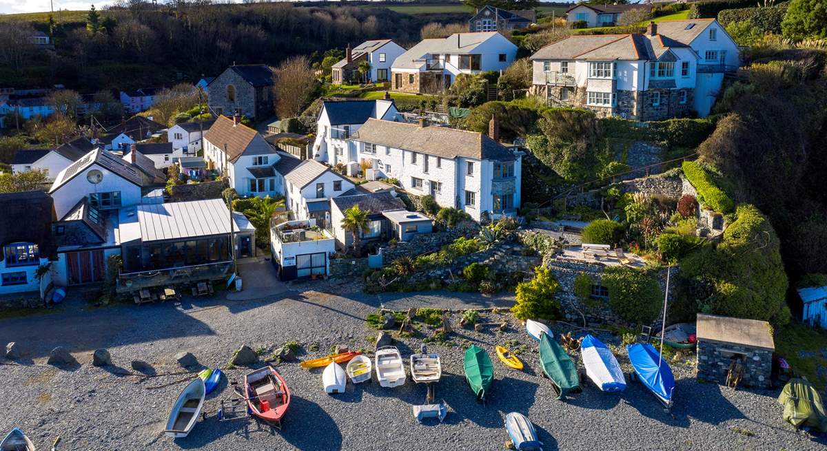 Bank Cottage is the middle cottage in the row of white traditional cottages and you can park on the beach car park below. 