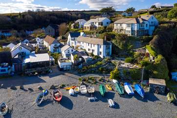 Bank Cottage is the middle cottage in the row of white traditional cottages and you can park on the beach car park below.