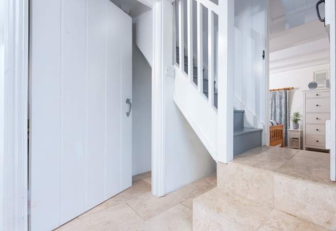 This traditional cottage pays homage to its roots with quirks, little steps of varying depth throughout and a steep staircase to the first floor. 