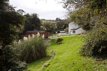 The setting is idyllic. There are lots of bunnies which like to visit, so please take care of little holes. Also, the garden is not enclosed so please keep an eye on the children.