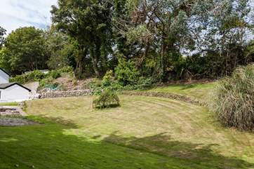 Steps lead down from the terrace into the garden.