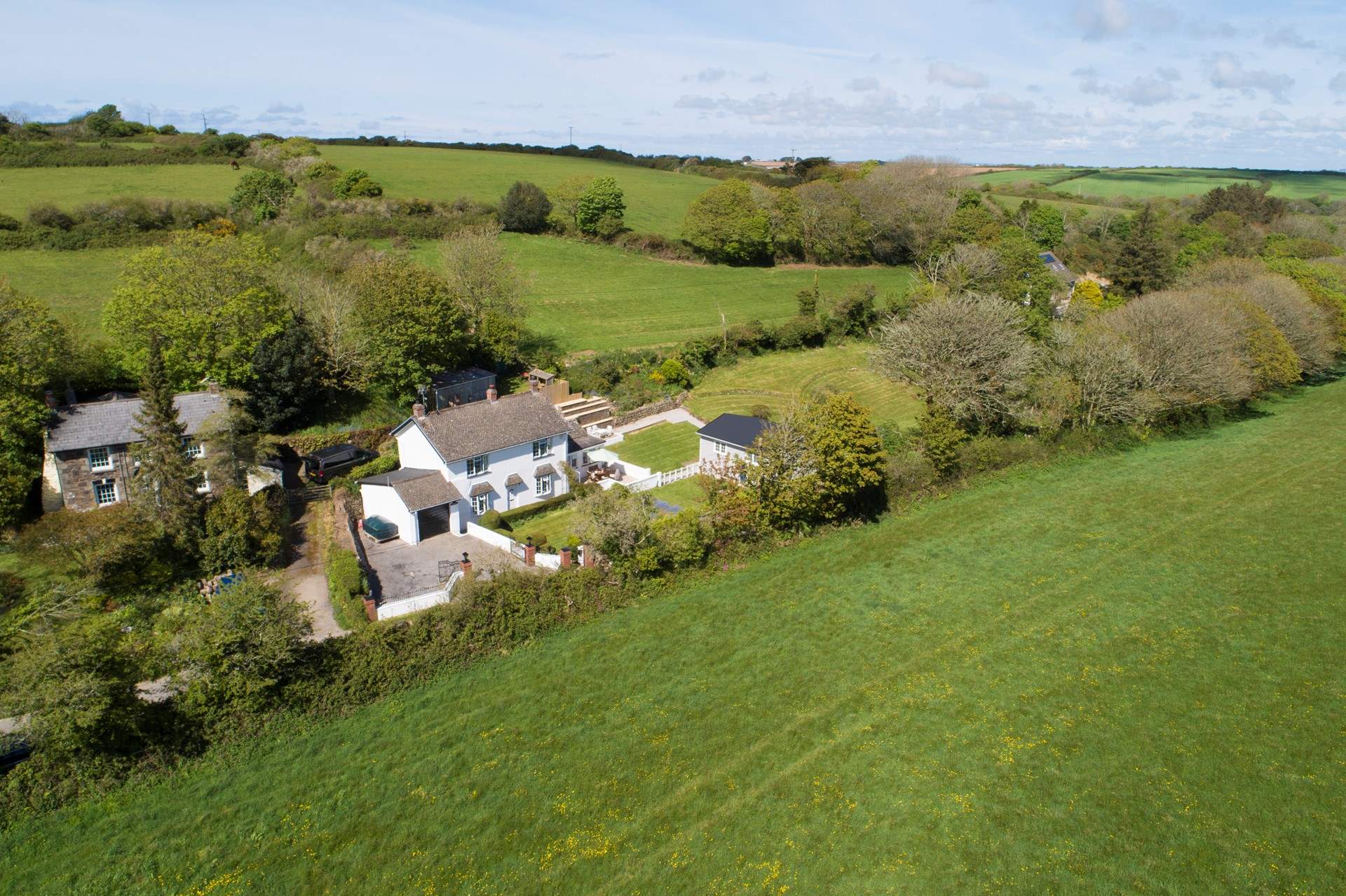 Surrounded by verdant countryside.  