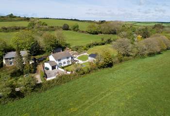 Surrounded by verdant countryside.  