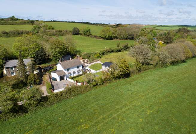 Surrounded by verdant countryside.  