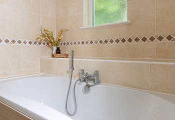Enjoy a long soak at the end of a busy beach day.