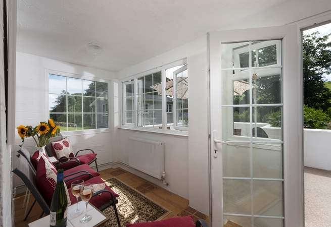 Sit back and relax in the conservatory.