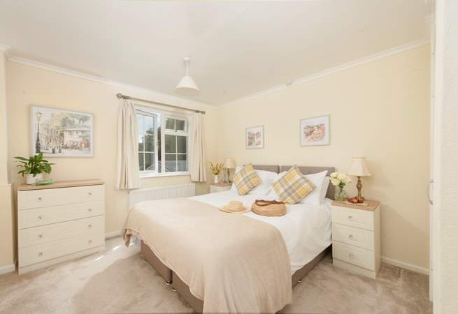 Bedroom 2 looks over the garden and has a king-size bed which can be made into twins. 