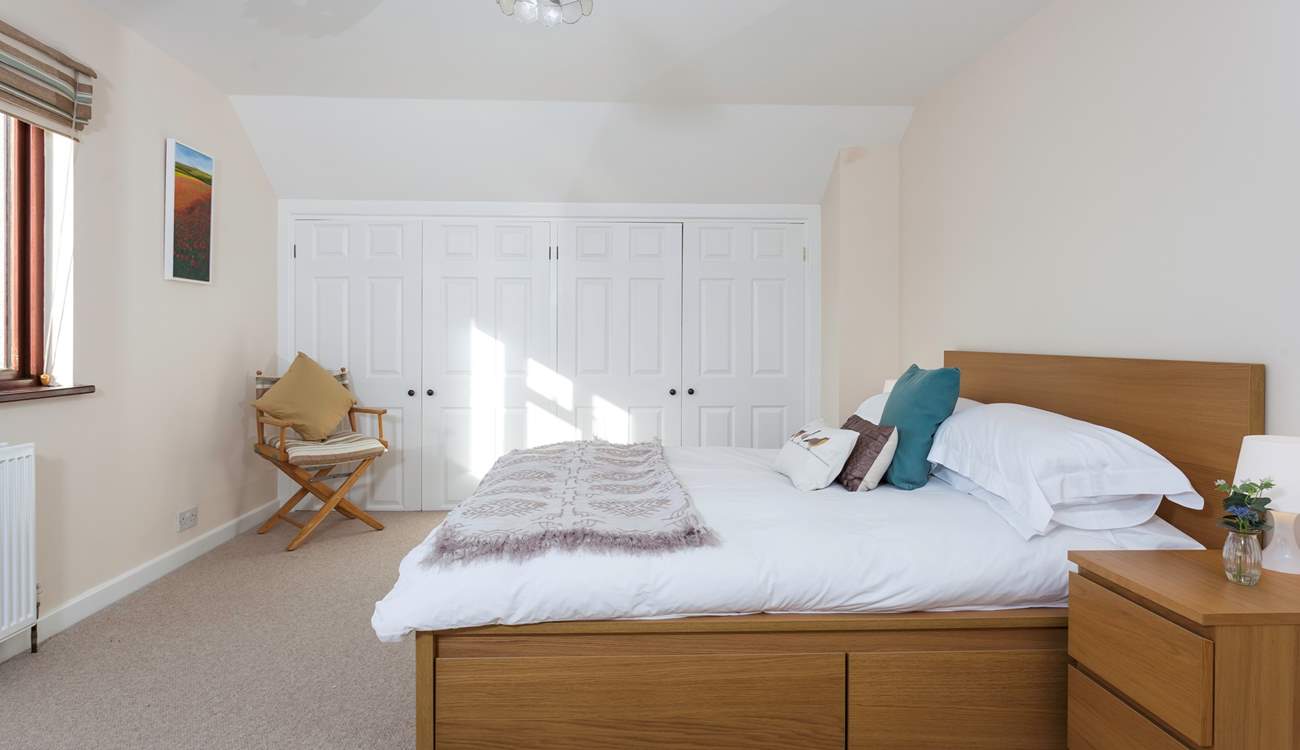 The master bedroom is an oasis of calm with a very comfortable bed. 