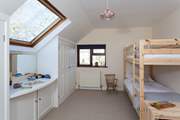 The younger members of the family will love the bunk bedroom.