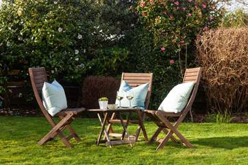 The lovely outside area is the perfect spot to enjoy a glass of wine with family.