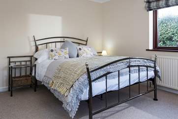 This pretty double bedroom is located on the ground floor.