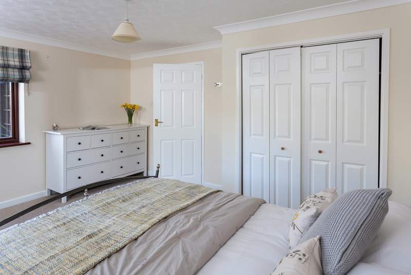 The ground floor double bedroom is styled in lovely linens.