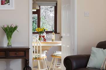 The cosy sitting room can be easily reached from the dining area.