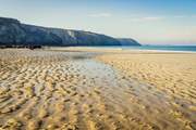 The rugged north coast has many hidden beaches and coves.