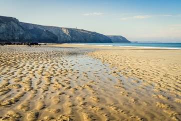 The rugged north coast has many hidden beaches and coves.