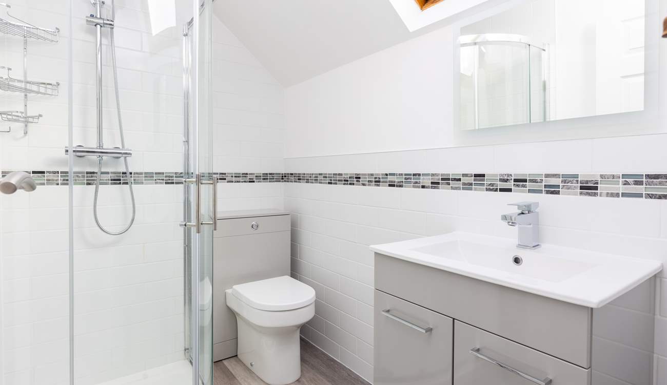 The sleek family shower-room is located on the first floor.