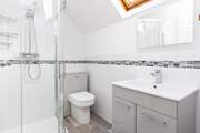 The sleek family shower-room is located on the first floor.