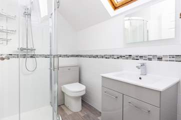 The sleek family shower-room is located on the first floor.