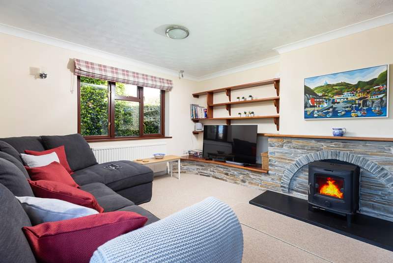 Trefechan has a wonderful cosy sitting-room with patio doors out to the terrace and garden. (Please note, the wood-burner is ornamental).