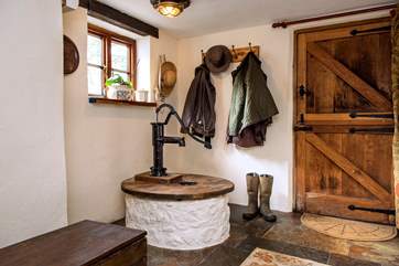 The old well remains in the house, it is quite a feature.