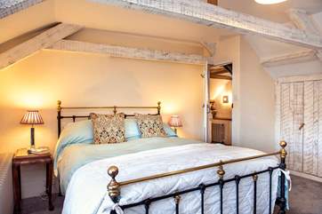 The cottage has two pretty bedrooms.