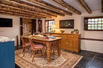Enjoy relaxing meals around the farmhouse-style table.