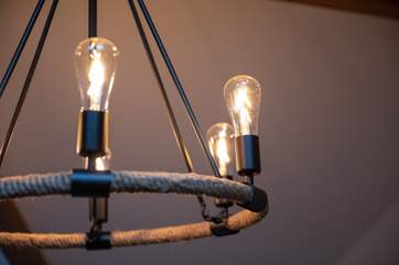 The lighting is so pretty, it certainly perfects the look and feel of this characterful house.