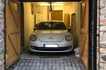 The garage is large enough for a VW beetle and equivalent.
