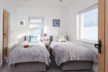 The twin bedroom on the ground floor has an en suite shower-room.