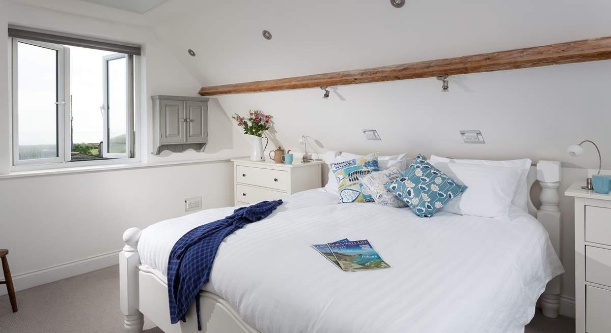 The main bedroom on the first floor has a luxurious super-king bed but feels very cosy with the sloped ceilings (Bedroom 3). 