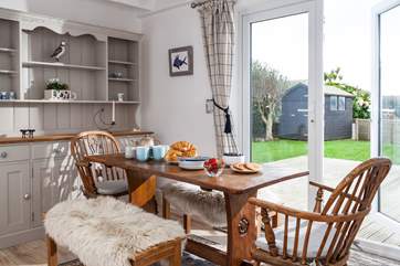 The dining-area also has double doors that open to the decking and garden which also has the fabulous outlook.
